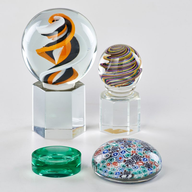 VENINI: Four pieces: two tabletop ball sculptures, millefiori paperweight, and puck, Italy, ca. 1960s; Spirals marked; Largest: 8 1/2" x 4 1/2"
