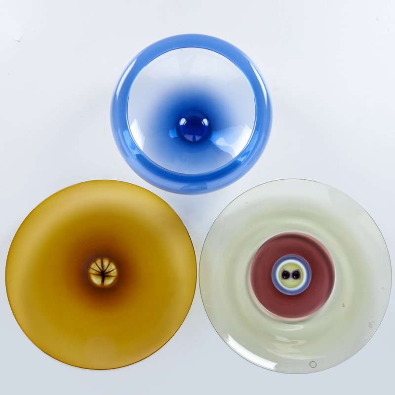 VENINI, ORREFORS: Two "Millennium III" plates, one textured and one with applied decoration, and similar Orrefors fruit bowl, Italy and Sweden, ca. 2000; Clear, frosted and blown glass; All marked; Plate: 14 3/4" dia.