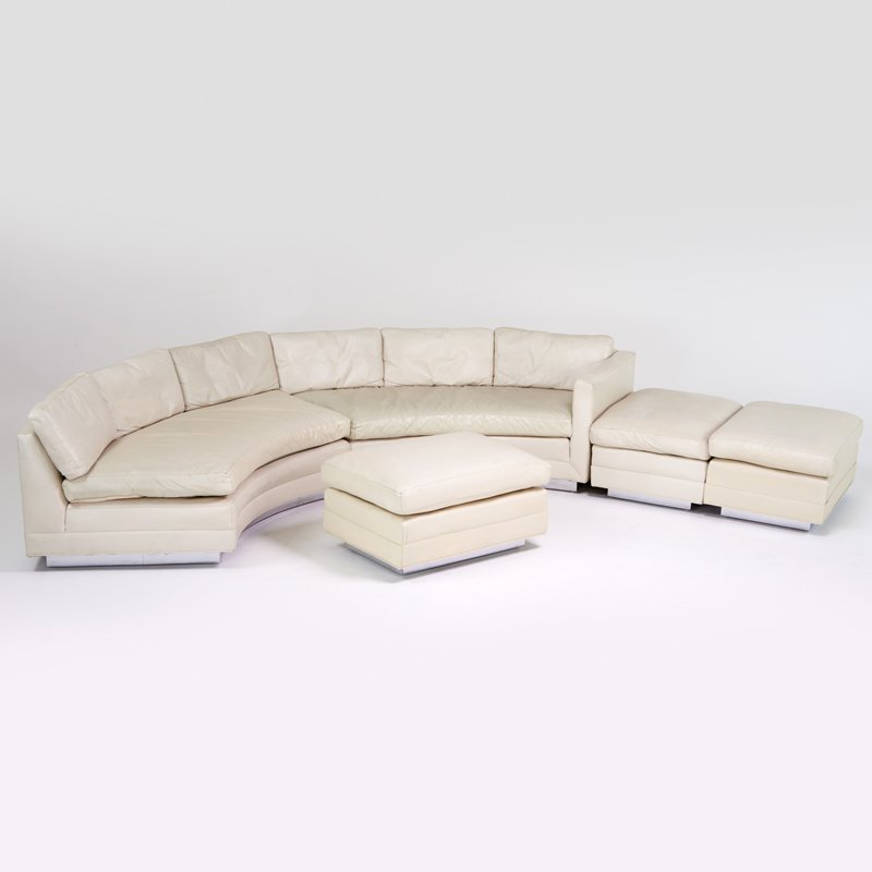 SWAIM: Sectional sofa, North Carolina, 1970s; Chromed steel, leather; Manufacturer's labels; Ottomans: 17" x 36" x 24", sofa, as shown: 25" x 147" x 35"