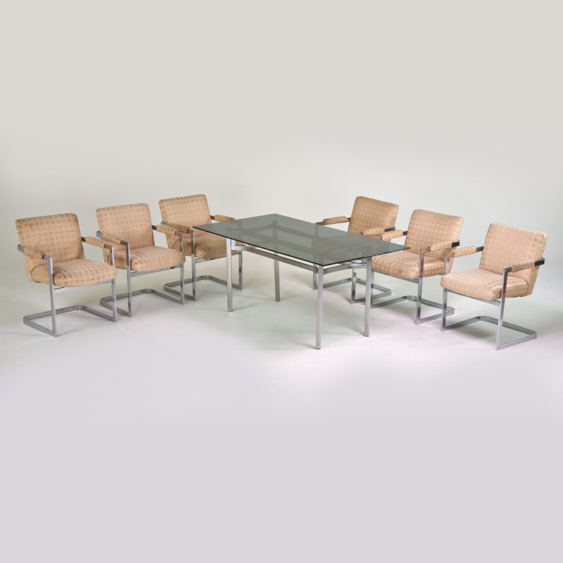 STYLE OF MILO BAUGHMAN: Dining table and six armchairs, USA, 1970s; Chromed steel, upholstery, glass; Unmarked; Table: 29 1/2" x 66" x 36", chair: 33 1/2" x 23 1/2" x 26"