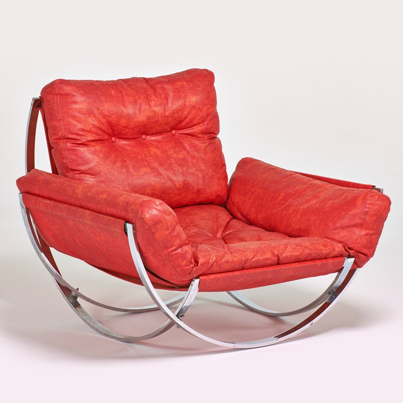 STYLE OF MILO BAUGHMAN: Oversized lounge chair, 1970s; Chromed steel, vinyl; Charlton upholstery label; 32" x 31" x 39"