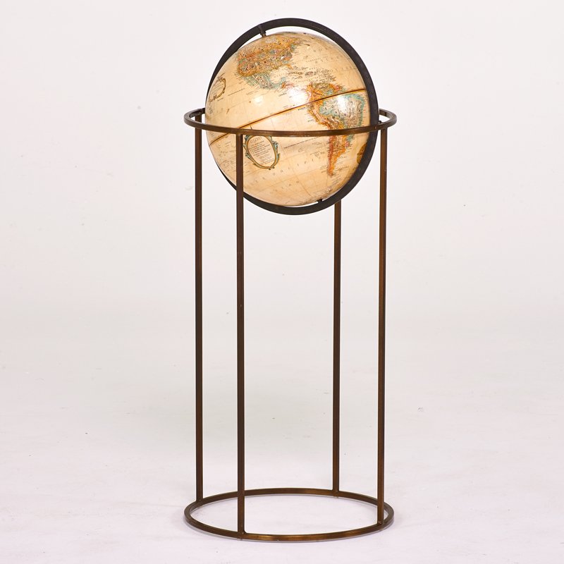 STYLE OF PAUL McCOBB: World globe, USA, 1960s; Bronzed metal, painted paper; Unmarked; 35 1/2" x 14" dia.