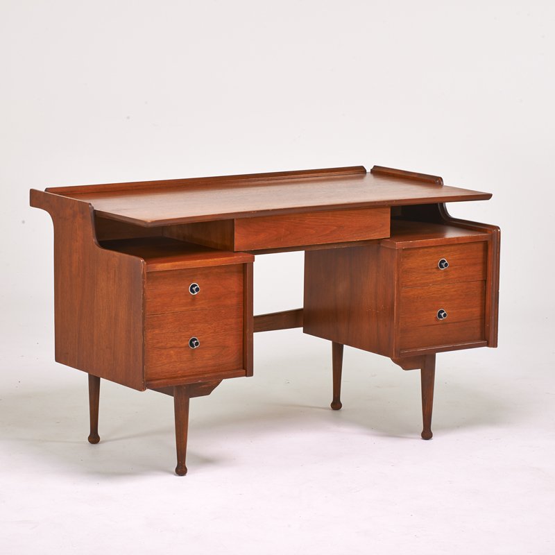 STYLE OF PAUL McCOBB: Desk, USA, 1960s; Walnut, enameled metal, aluminum; Branded "Hooker"; 31" x 50" x 26"