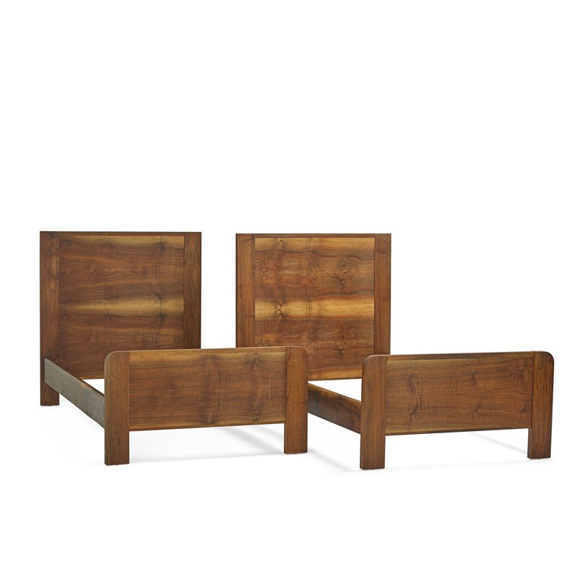 ROY McMAKIN Pair of beds: ROY McMAKIN (b. 1956) BIG LEAF MFG CO Pair of solid walnut twin beds, Seattle, WA, 1990s Each branded Roy McMakin Big Leaf MFG Co. Seattle WA Total: 42" x 40" x 79 1/2", interior: 76 1/2" x 37"