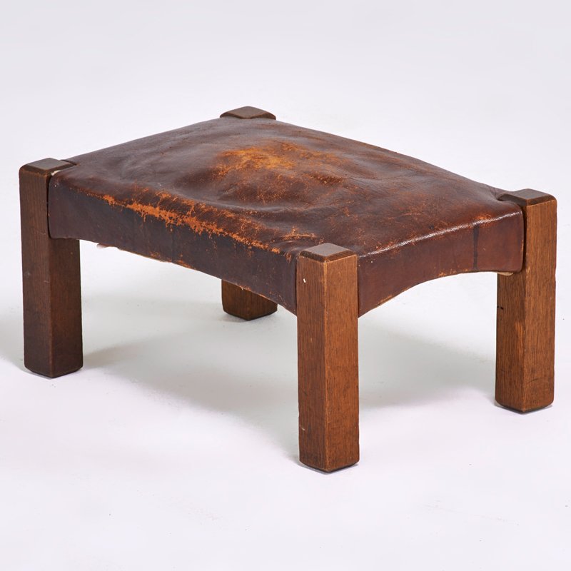 GUSTAV STICKLEY (Attr.): Footstool, Eastwood, NY, ca. 1908; Quartersawn oak, leather; Unmarked; 9 1/2" x 18 3/4" x 12 3/4"