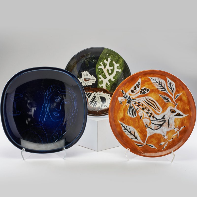 JEAN LURCAT; SANT-VINCENS; ETC: Three chargers: Lurcat decorated with birds, together with Witold Gordon with shells and Arabia with female figure, France/USA/Finland, 1950s; All marked; Sant-Vincens: 1 1/2" x 15 3/4"