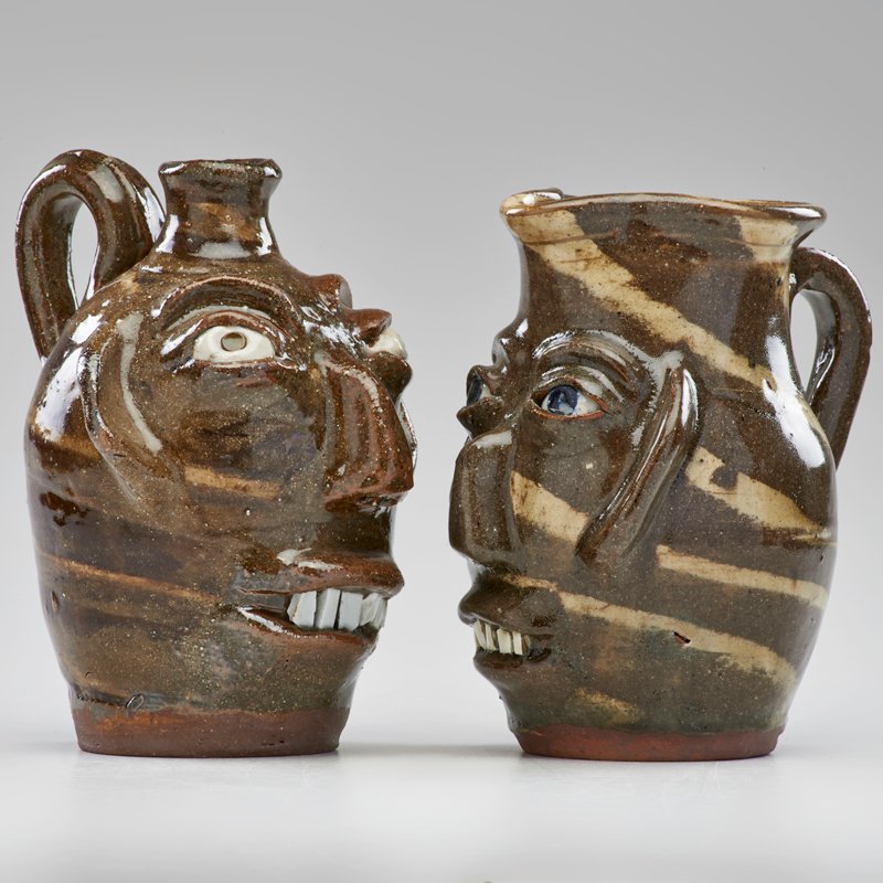 BB CRAIG: Two face jugs, Vale, NC; Glazed stoneware; Both marked; Taller: 8 1/4" x 5"