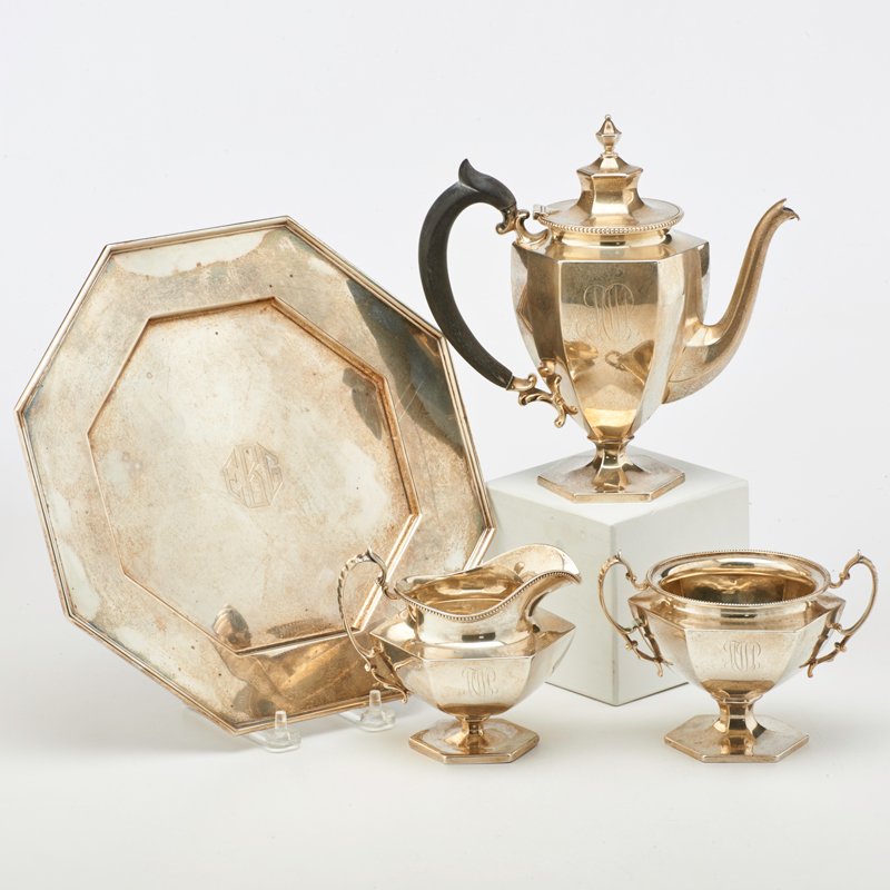 STERLING LUNCHEON COFFEE SERVICE AND CAKE PLATE: Howard sterling company: Coffee pot with ebonized wood handle, engraved on interior base, "June 1897," 7 1/2," open sugar bowl, 3 3/4," creamer, 3 1/2," Gorham octagonal cake plate, 10 1/4"; Monogramm