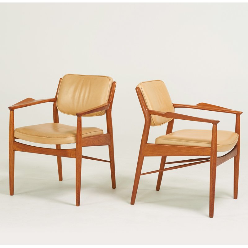ARNE VODDER; SIBAST: Pair of arm chairs, Denmark, 1960s; Teak, leather; Manufacturer's labels; 31" x 25 1/2" x 26"