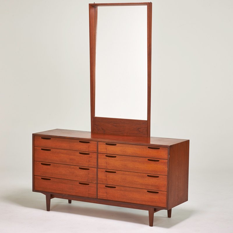 IB KOFOD-LARSEN (Attr.); SELIG: Teak dresser and mirror, Denmark, 1960s; Metal manufacturer label; Mirror: 51" x 26", dresser: 30 1/2" x 59" x 17 1/2"