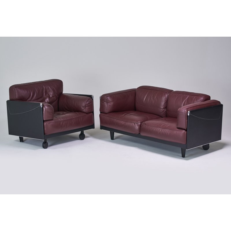 POLTRONA FRAU: Sofa and lounge chair, Italy, 1980s; Stitched leather, chromed steel; Manufacturer's markings; Lounge: 33" x 39 1/2" x 34", sofa: 30" x 63 1/2" x 35"