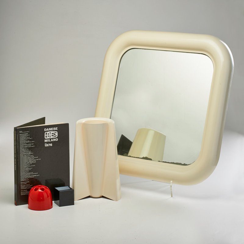 DANESE; ARTEMIDE: Three pieces Danese: Cubo ashtray by Bruno Munari, Pago-Pago reversible vase by Enzo Mari, and complete 1976 catalog, together with two pieces Artemide: Dedalino pencil holder and Delfo mirror, Italy,