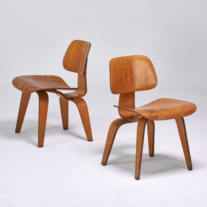 CHARLES AND RAY EAMES; HERMAN MILLER: Pair of ash dining chairs (DCW), Zeeland, MI, 1950s; Unmarked; 29" x 19 1/2" x 21"