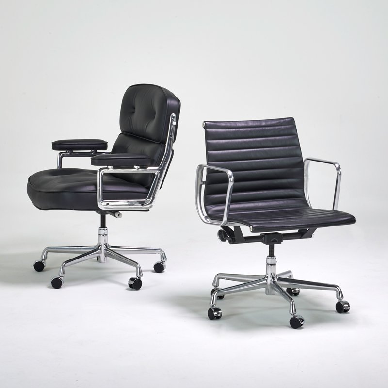 CHARLES AND RAY EAMES; HERMAN MILLER: Two rolling office chairs: "Time-Life" and "Aluminum Group," Zeeland, MI, 2000s; Polished aluminum, leather, casters; Manufacturer's label to Time-Life; Time-Life: 37" x 26 1/2" x 29", Soft Pad: 33" x