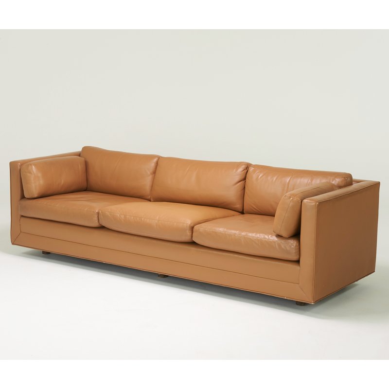 WARD BENNETT; BRICKELL ASSOCIATES: Sofa, USA, 1970s; Stained wood, leather; Unmarked; 27" x 90" x 34"