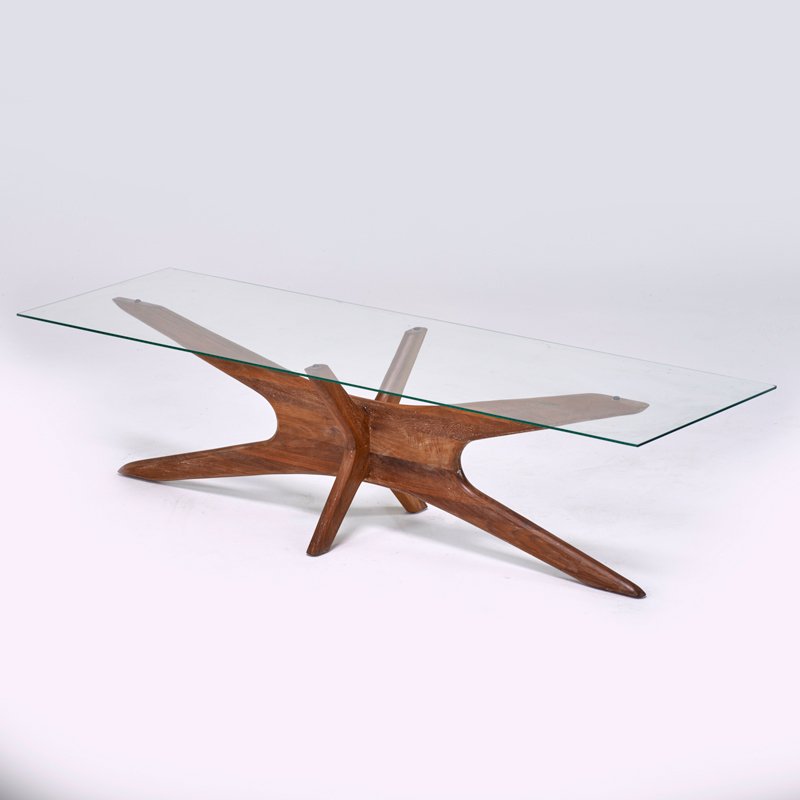 ADRIAN PEARSALL; KRAFT ASSOCIATES: Coffee table, Wilkes Barre, PA, 1960s; Sculpted walnut, glass; Unmarked; 16" x 60" x 19"