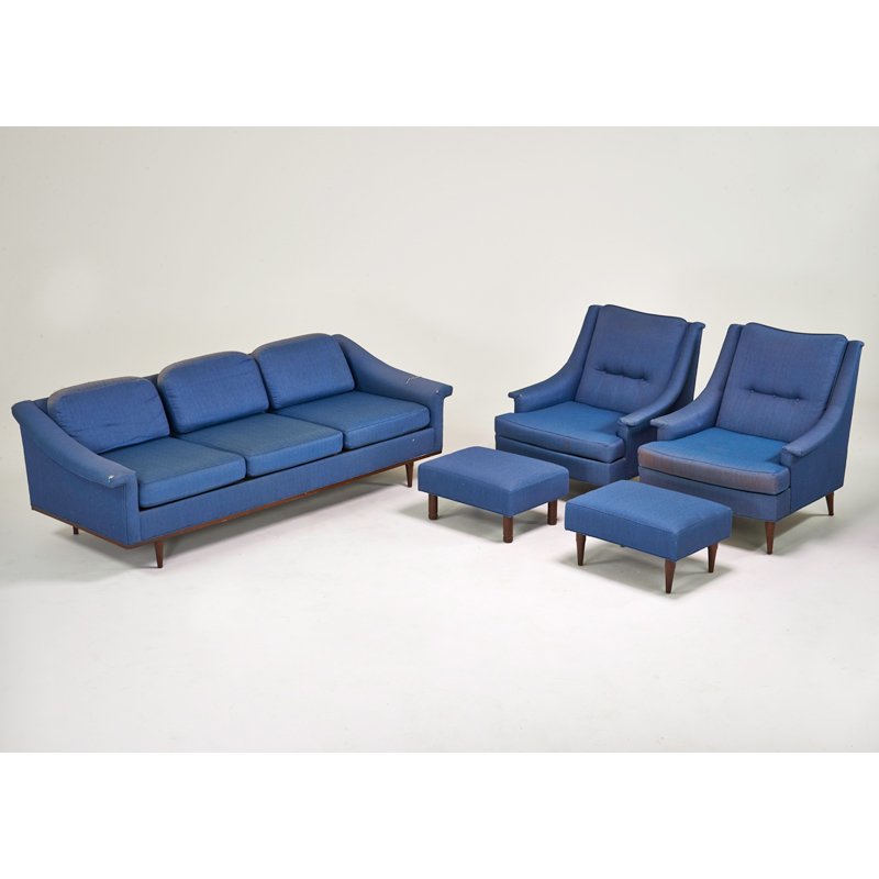 SELIG: Sofa, lounge chair and two ottomans, USA, 1960s; Stained wood, upholstery; Manufacturer's labels; Sofa: 27" x 84" x 35 1/2", lounge: 35" x 33" x 37"
