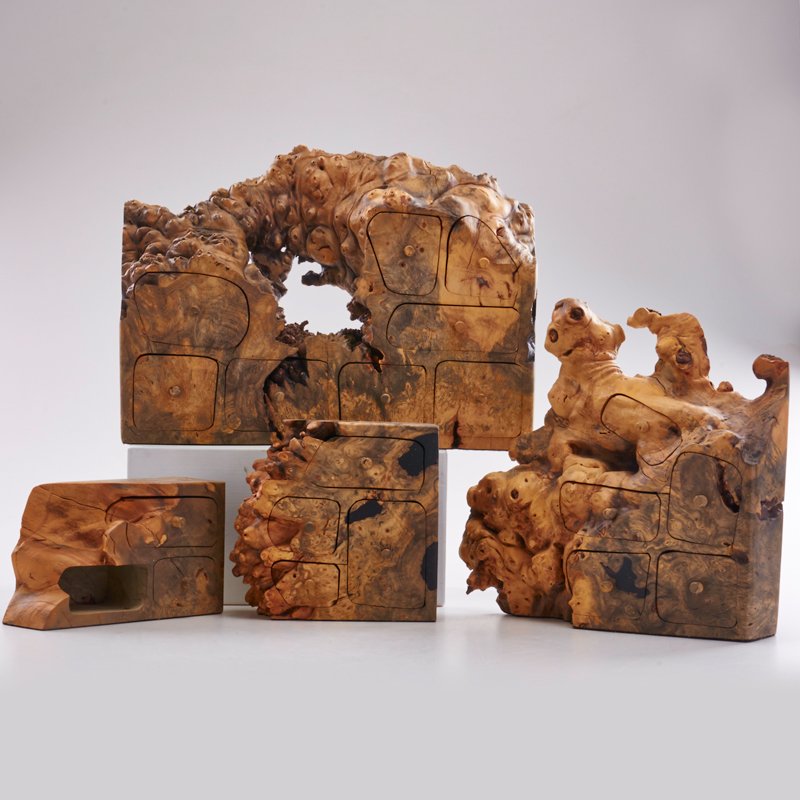 JEFF TRAG: Four jewelry boxes, Micanopy, FL, 1987; Buckeye burlwood, velvet; All branded: "Jeff Trag 1987 Micanopy FLA"; Tallest: 12" x 16" x 3 1/2"