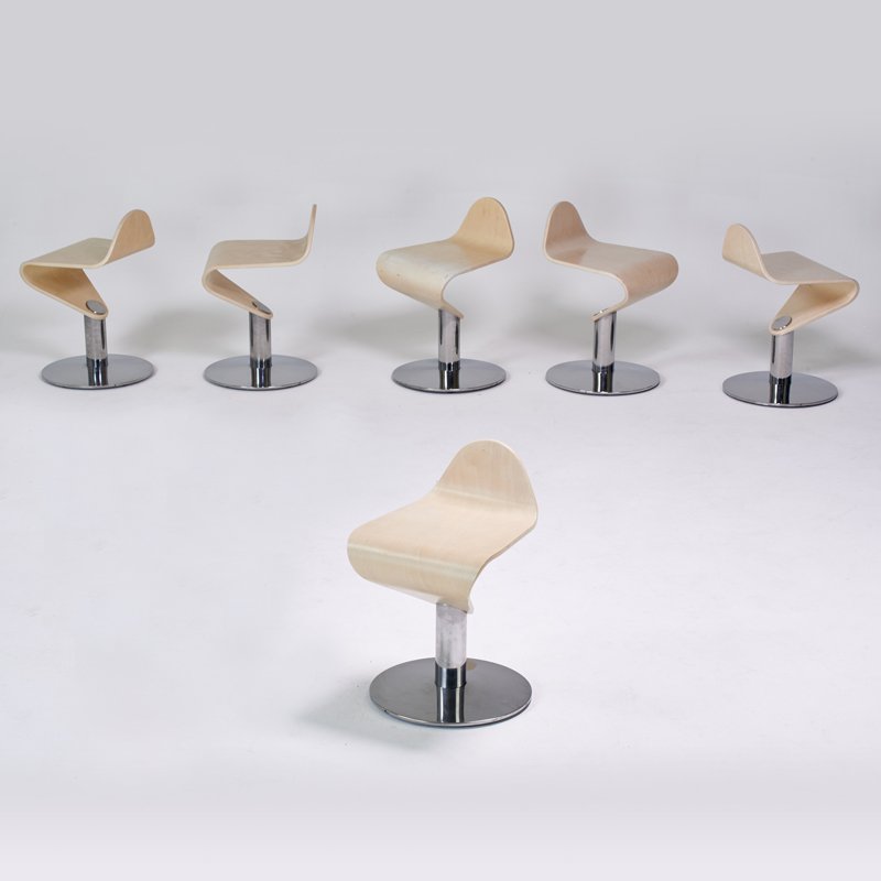 ALLERMUIR: Set of six surfboard stools, United Kingdom, 2000s; Stained bent plywood, chromed steel; Manufacturer's labels; 24" x 15" x 15 1/2"