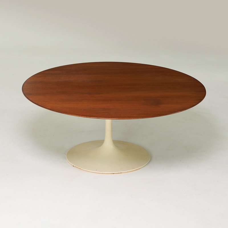 EERO SAARINEN; KNOLL ASSOCIATES: Tulip coffee table, New York, 1960s; Painted metal, walnut; Unmarked; 15" x 36" dia.