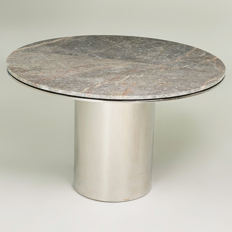 KNOLL INTERNATIONAL: Dining table, New York, 1970s, Marble, stainless steel; 29" x 48" dia.