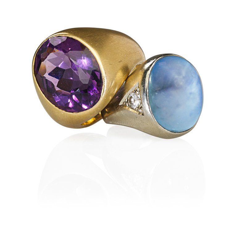 GENT'S STAR SAPPHIRE OR AMETHYST 14K GOLD RINGS: Oval cabochon cut star sapphire, 34 cts. by formula, and two RBC diamonds, .50 ct. TW in 14k wg., size 8 1/2; Oval faceted amethyst, 17.5 cts. by formula in 14k yg., size 10. Ca. 1965. 29.1 dwt.