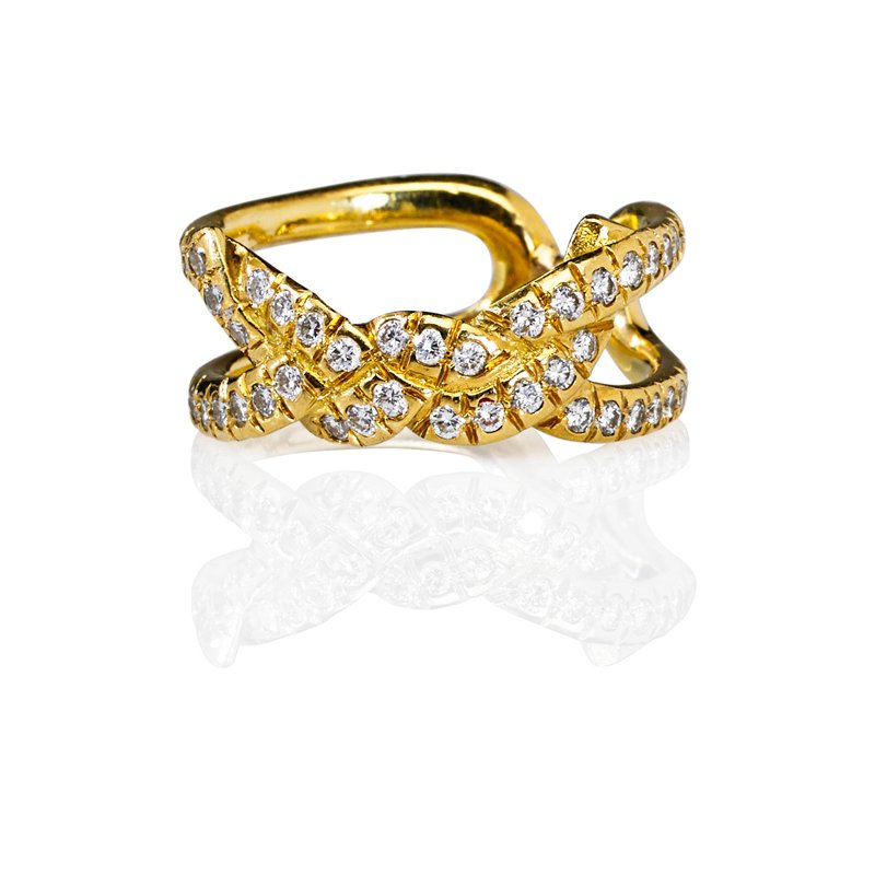 TIFFANY & CO. 18K DIAMOND KNOT MOTIF RING: 18k yg. and RBC diamonds, approx. .80 ct. TW, in open delicate design, ca. 2005. Marked 18k, Tiffany & Co. Size 5. 2.8 dwt.