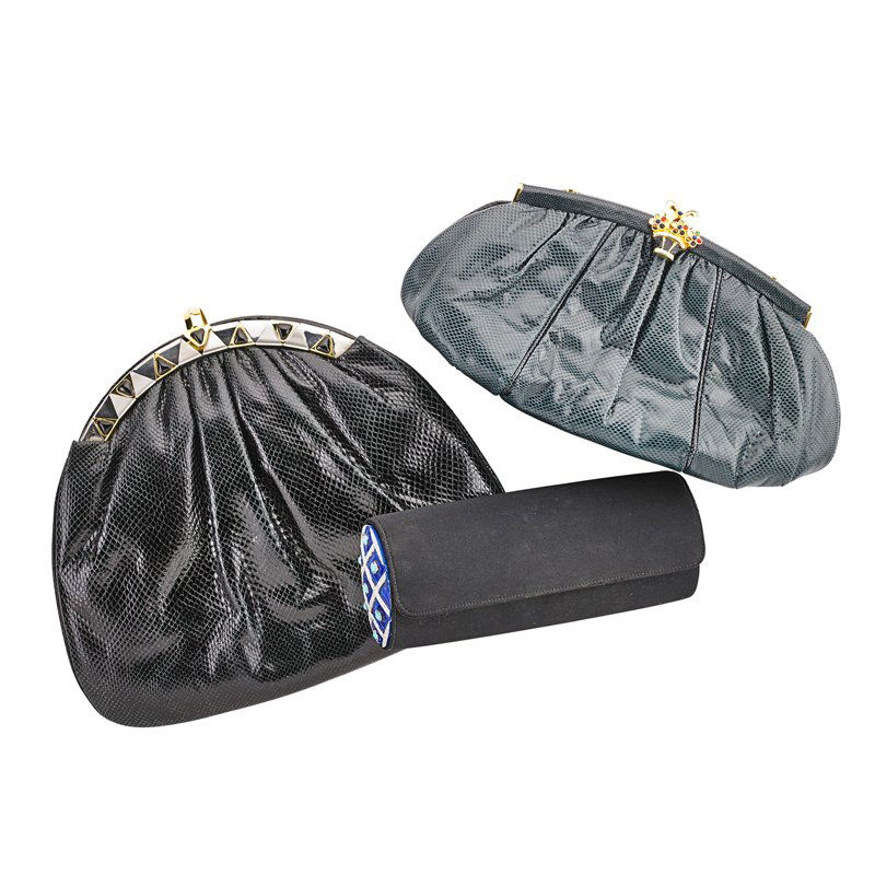 TWO JUDITH LEIBER CLUTCHES, KJL EYEGLASS CASE: Judith Leiber dark teal lizard skin clutch with multi gem-set floral bouquet closure, gold tone hardware, chain; Black lizard skin clutch with gold, silver tone and "onyx" set frame; Kenneth Jay Lane