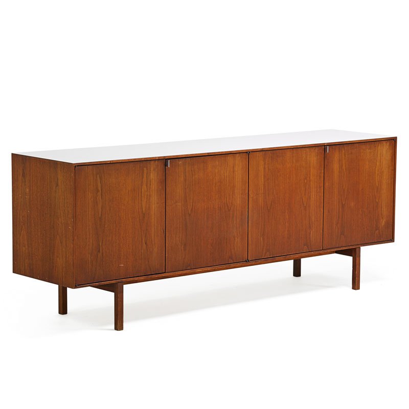 FLORENCE KNOLL Cabinet: FLORENCE KNOLL (b. 1917) KNOLL ASSOCIATES Cabinet, New York, 1960s Walnut, chromed metal, laminate Unmarked 29" x 75 1/2" x 18"