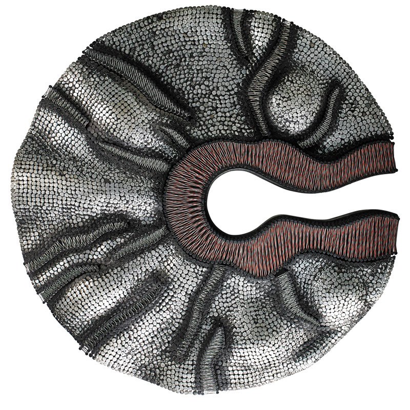 OLUF GRAVESEN Wall hanging sculpture: OLUF GRAVESEN (1943 - 1987) Wall hanging sculpture, New York, 1979 Painted wood, nails, electric wire Signed and dated 36" dia. x 3" Literature: James Alan Nash, "Oluf Gravesen: Hitting the Nail on th