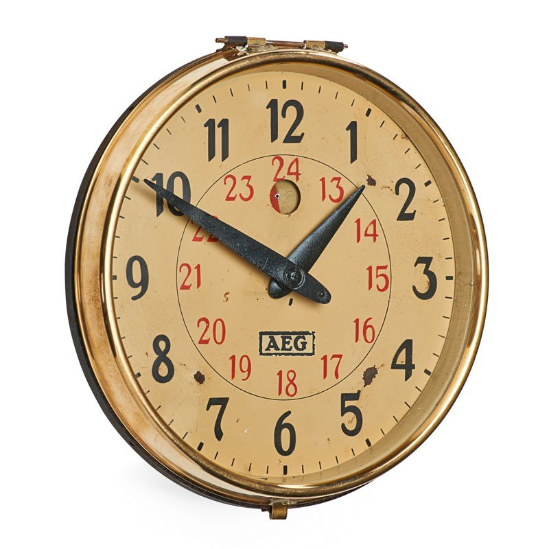 PETER BEHRENS Railroad station clock: PETER BEHRENS (1868 - 1940) A.E.G. Railroad station clock, Germany, 1910s Copper, glass, enameled metalFace marked AEG with AEG metal label to reverse 10 1/4" x 4 1/4"