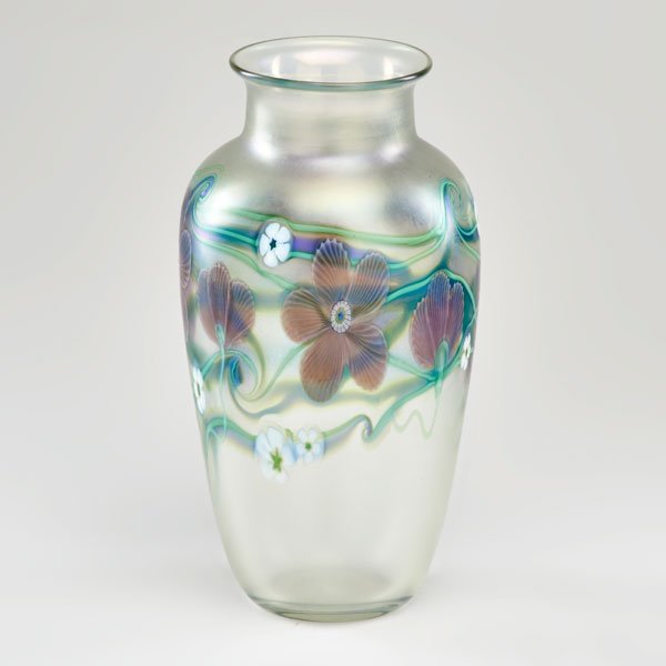ORIENT & FLUME: Iridescent art glass vase with floral motif, Chico, CA, 1985; Etched "Orient & Flume 1985 F22"; 9 1/2" x 4 1/2"