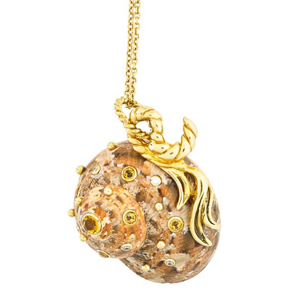 JEWELED SHELL 18K GOLD NECKLACE AFTER SCHEPPES: Conchoidal shell set with diamonds and yellow sapphires, gold base, ornamental bail, and 20" chain. 1 1/4". 13.9 dwt. GW