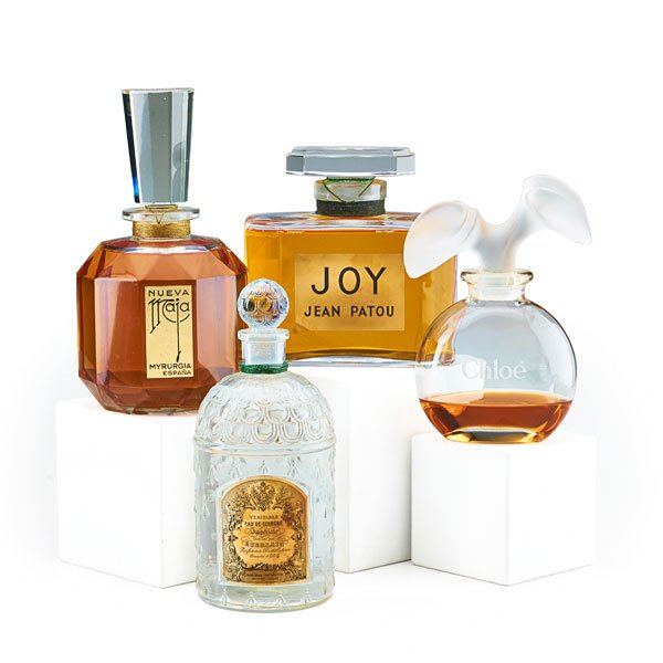 FOUR LARGE PERFUME BOTTLE FACTICES (1 of 1)