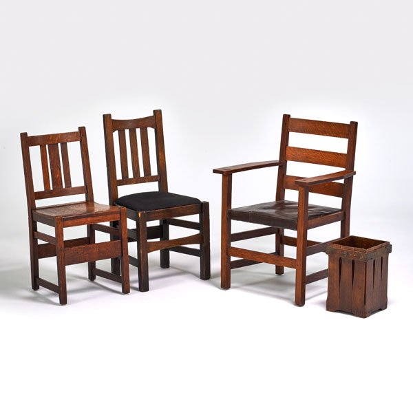 L. & J.G. STICKLEY, STICKLEY BROS., ETC.: Four pieces: L & J.G. armchair, two Bros. side chairs, and Lakeside Craft Shop waste basket, USA, ca. 1910-1915; Quartersawn oak, leather, fabric, patinated metal; Unmarked; Armchair: 37" x 26" x 21 1