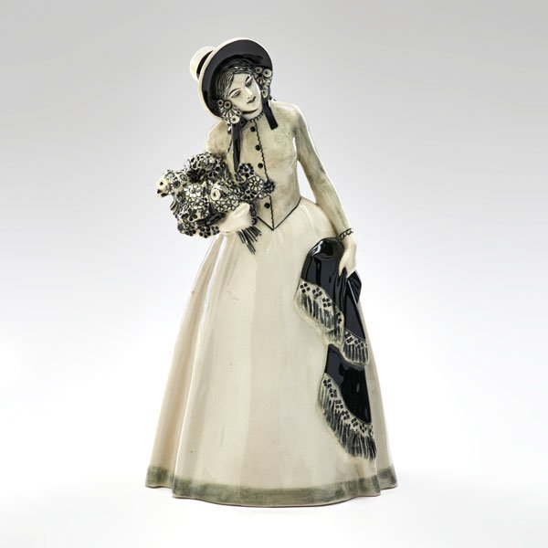 EMIL MEIER; WIENER WERKSTATTE: Glazed ceramic sculpture of woman in period dress, Austria, ca. 1908; Marked "Meier" with Weiner Werkstatte stamp; 9 3/4" x 5"