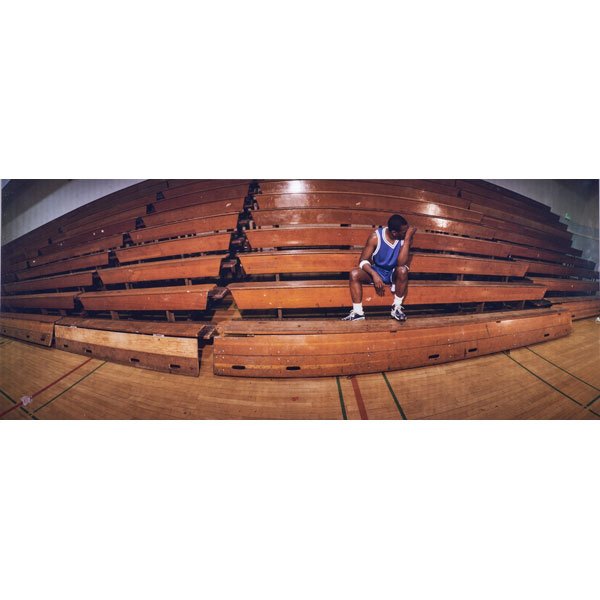 KORI NEWKIRK (American, b. 1970): Acrylic mounted print of basketball player on bleachers; 23 7/8" x 57 7/8"