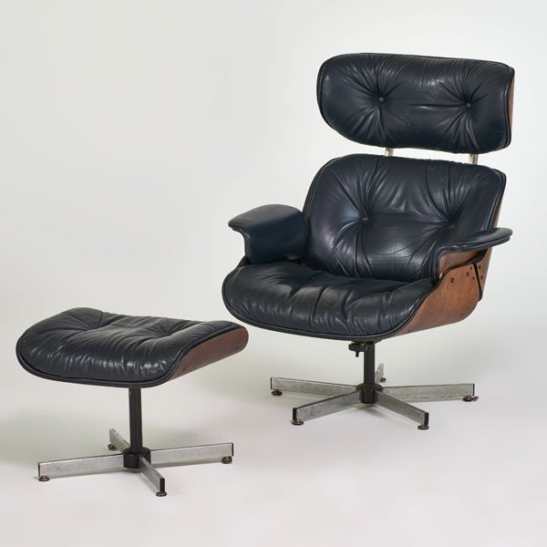 STYLE OF CHARLES AND RAY EAMES; SELIG: Lounge chair and ottoman, USA, 1970s; Vinyl, chromed and enameled steel, walnut; 39" x 33" x 34", ottoman: 16 1/2" x 31" x 17 1/2"