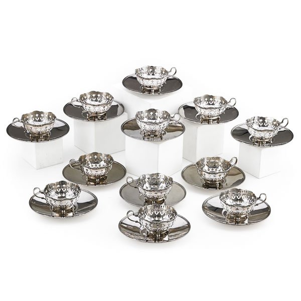 TIFFANY AND CO. STERLING: Twelve open cups and saucers, America, early 20th c. Marked for John C. Moore II Director 1907-1947 2 1/2" x 6", 94.18 OT