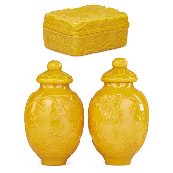 CHINESE PEKING GLASS: Three: Pair of covered ginger jars and covered box each with blossom and branch design, China, 19th/20th c. Ginger jar: 8 1/2"