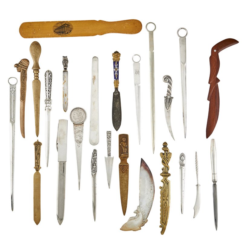 GROUP OF LETTER OPENERS AND PAGE SLICES: Twenty-five: Seven silver or silver-handled, eighteen of various material and design, primarily from the U.S.A., 20th c.; Longest: 11 1/4"; All pictured online