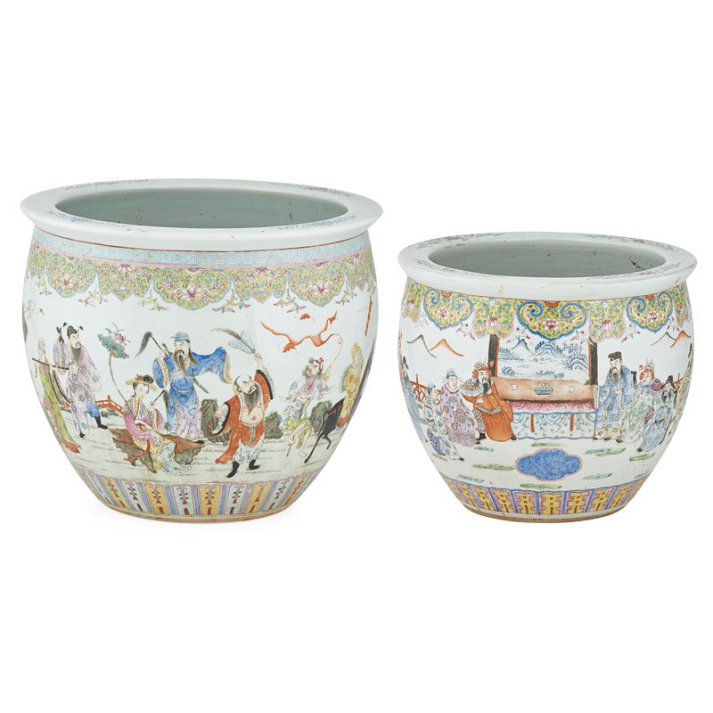 TWO CHINESE FAMILLE ROSE PORCELAIN JARDINERES: Each decorated with figural scenes with scrolling floral design on yellow ground, China, ca. 1830s; Taller: 15 1/2" x 18"; Provenance: Fred B. Nadler Antiques, Inc., Bay Head, New Jersey, September 19