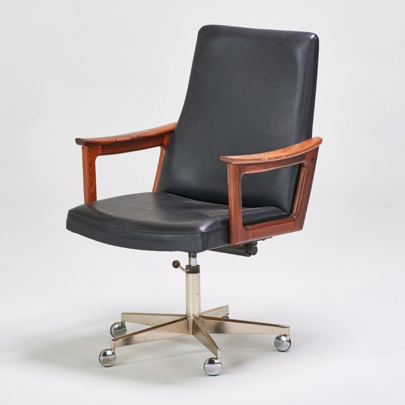 ARNE VODDER; SIBAST: Swivel desk chair, Denmark, 1970s; Leather, rosewood, chromed steel, casters; Stamped "Made in Denmark"; 37 1/2" x 25 1/2" x 26"
