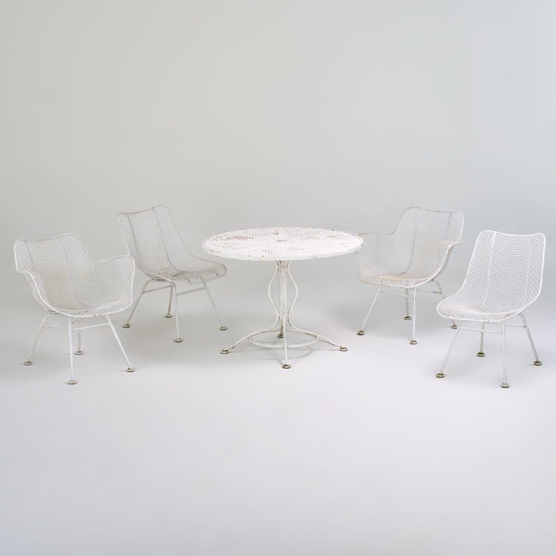 RUSSELL WOODARD: Five piece "Sculptura" dining set: Dining table and four chairs, two side-, two arm-, USA, 1950s; Enameled steel and vinyl upholstery; Unmarked; Table: 25 1/2" x 36", arm: 27" x 25" x 26 1/2", side: 2