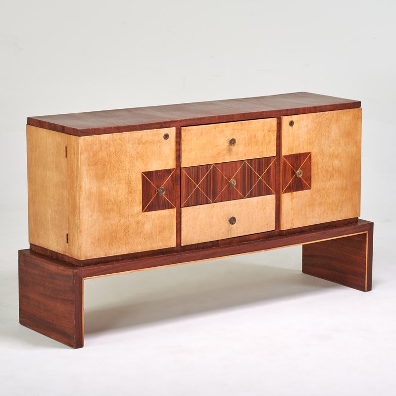 EUROPEAN ART DECO: Cabinet; Mahogany, quilted maple, rosewood, brass; Remnants of label; 37" x 67 1/2" x 19 1/2"