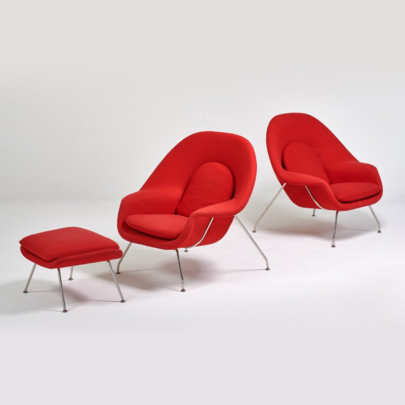 STYLE OF EERO SAARINEN: Pair of womb-type chairs with ottoman, ca. 1990; Wool, chromed steel; Unmarked; Chair: 38" x 40" x 36", ottoman: 15" x 25" x 22"