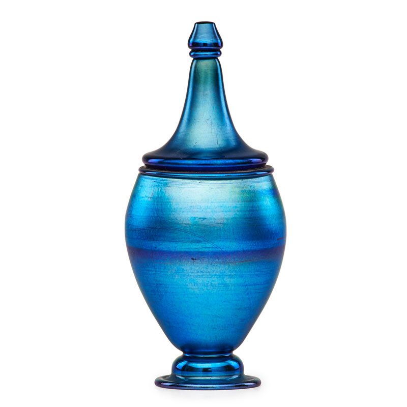 TIFFANY STUDIOS Experimental Favrile glass jar: TIFFANY STUDIOS;Experimental blue Favrile glass jar, New York,1917; Base etched x236 8274L L.C. Tiffany - Favrile B, lid etched x236 9408L A; 9 3/4" x 4";