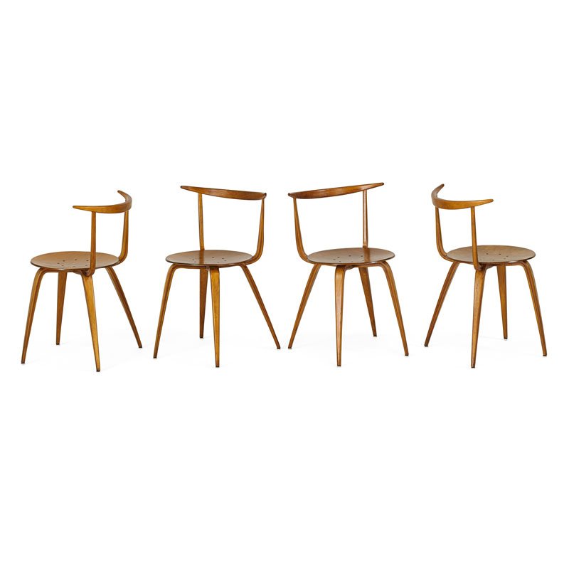 GEORGE NELSON; HERMAN MILLER Four Pretzel chairs: GEORGE NELSON (1908 - 1986);HERMAN MILLER;Four Pretzel chairs, Zeeland, MI, 1950s; Laminated bent plywood; Unmarked; 30" x 20" x 19";