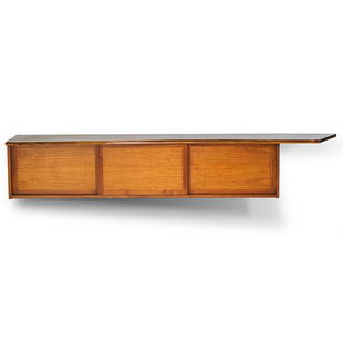 GEORGE NAKASHIMA Hanging Wall Case: GEORGE NAKASHIMA;NAKASHIMA STUDIOS;Hanging Wall Case, New Hope, PA, 1973; Walnut, oak interior; Signed with client name; 18 1/4" x 104" x 19";Provenance: Copy of original invoice