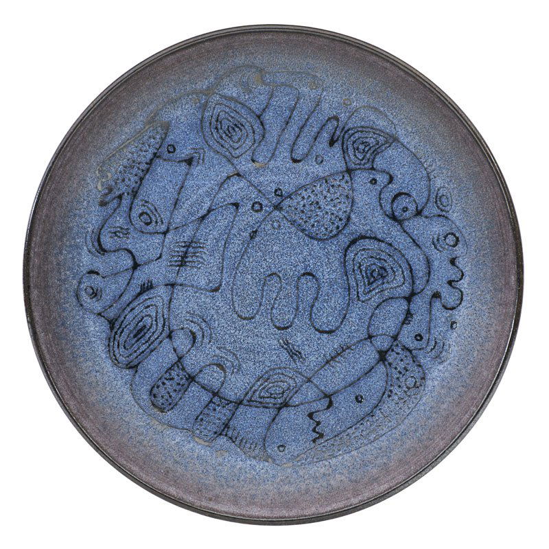 SCHEIER Early charger: EDWIN SCHEIER (1910 - 2008);MARY SCHEIER (1908 - 2007);Early glazed ceramic charger with abstract figures, New Hampshire, 1950s; Incised Scheier; 1" x 11";